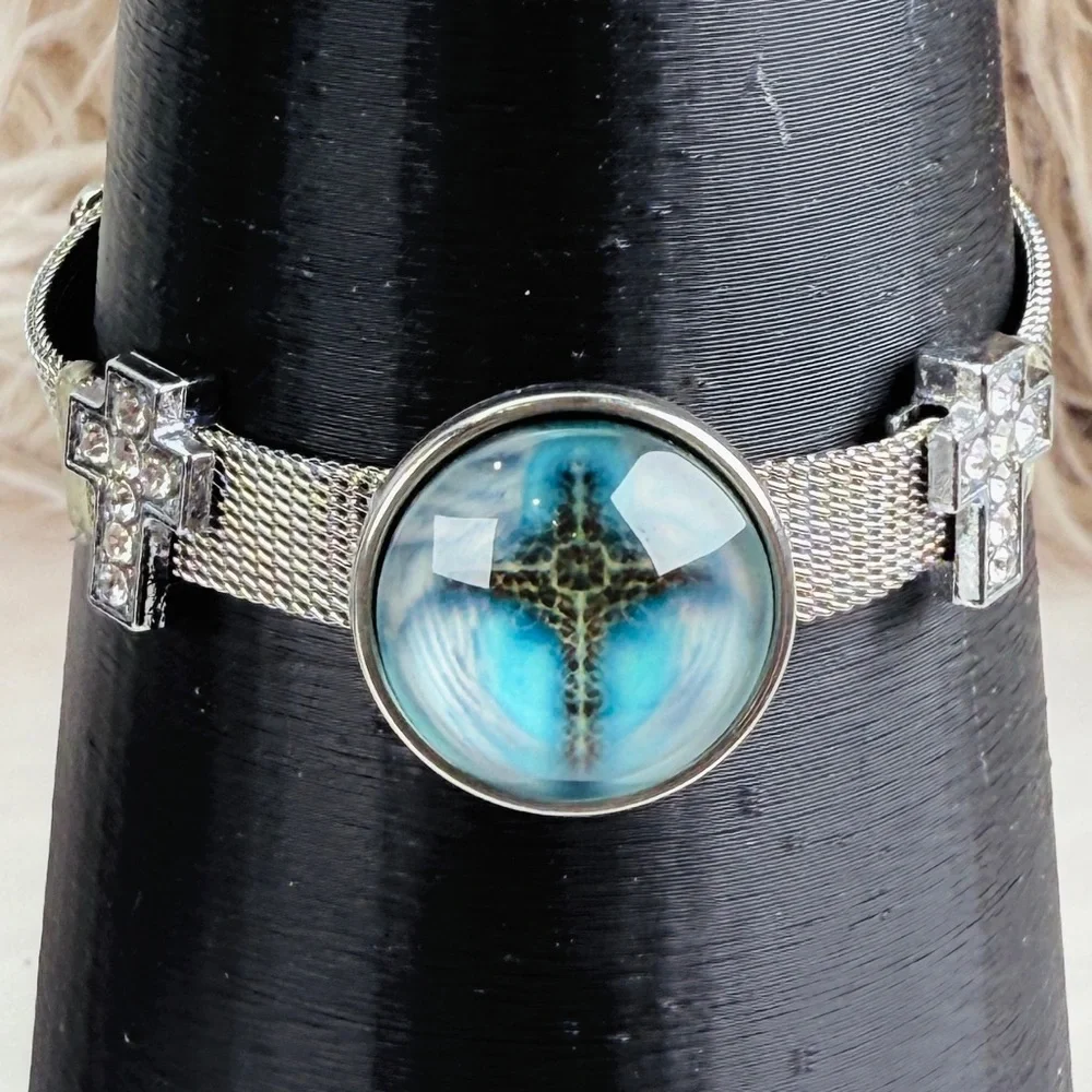 Silvertone Mesh Snap Bracelet with Blue Cross Design